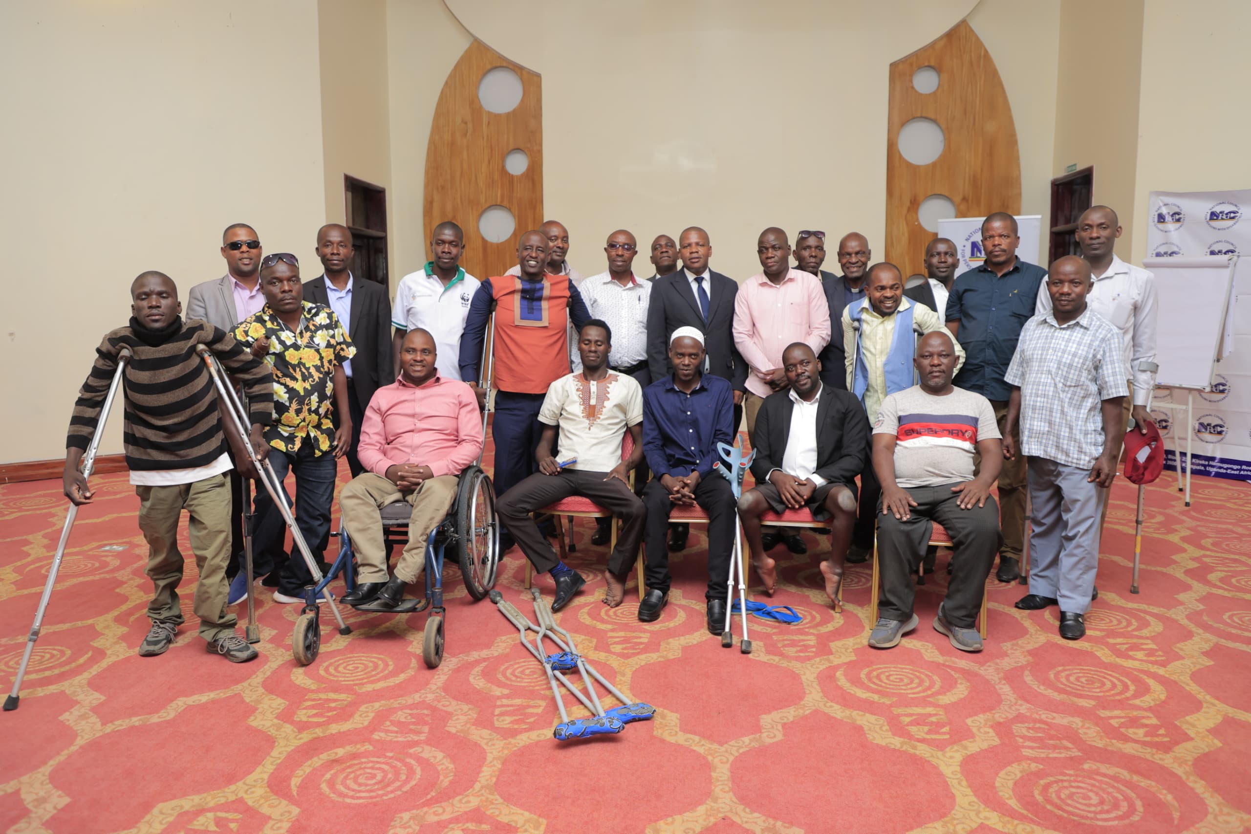 A photo of persons with different disabilities with the Commissioner for Disability