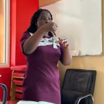 A young woman making her presentation in Sign Language